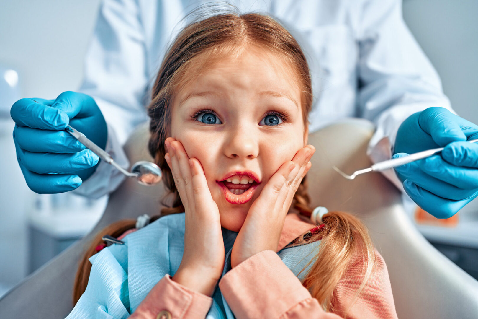 Dentist visit with surprised child
