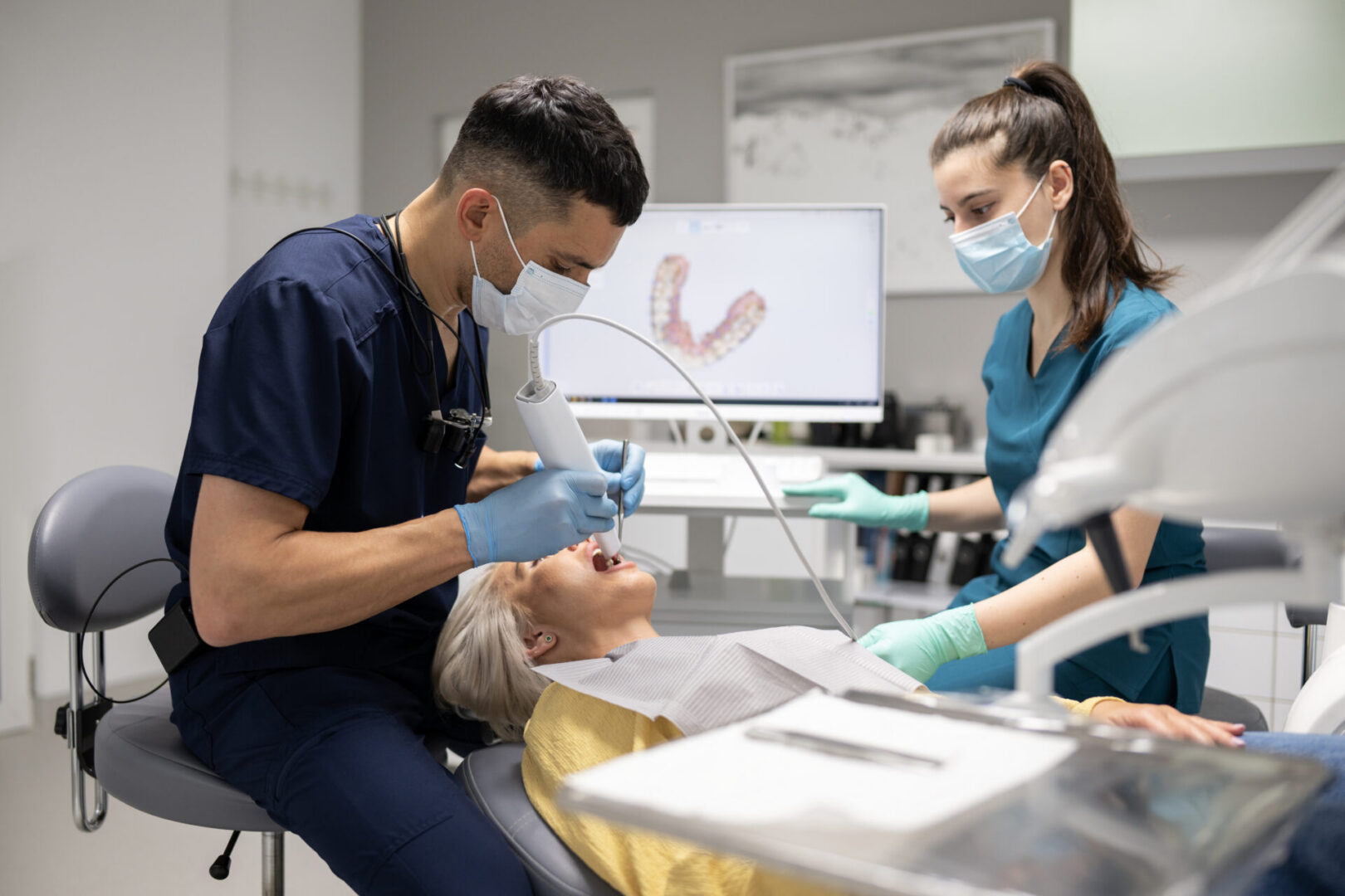 Dental team working on a patient