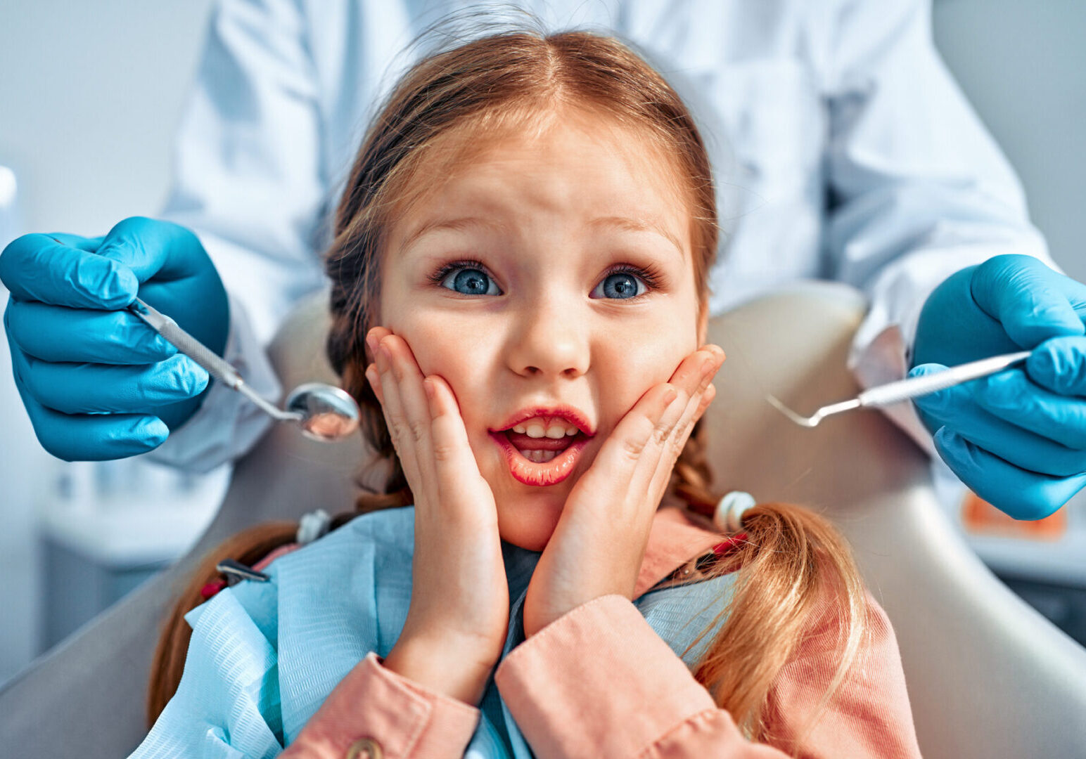 Dentist visit with surprised child