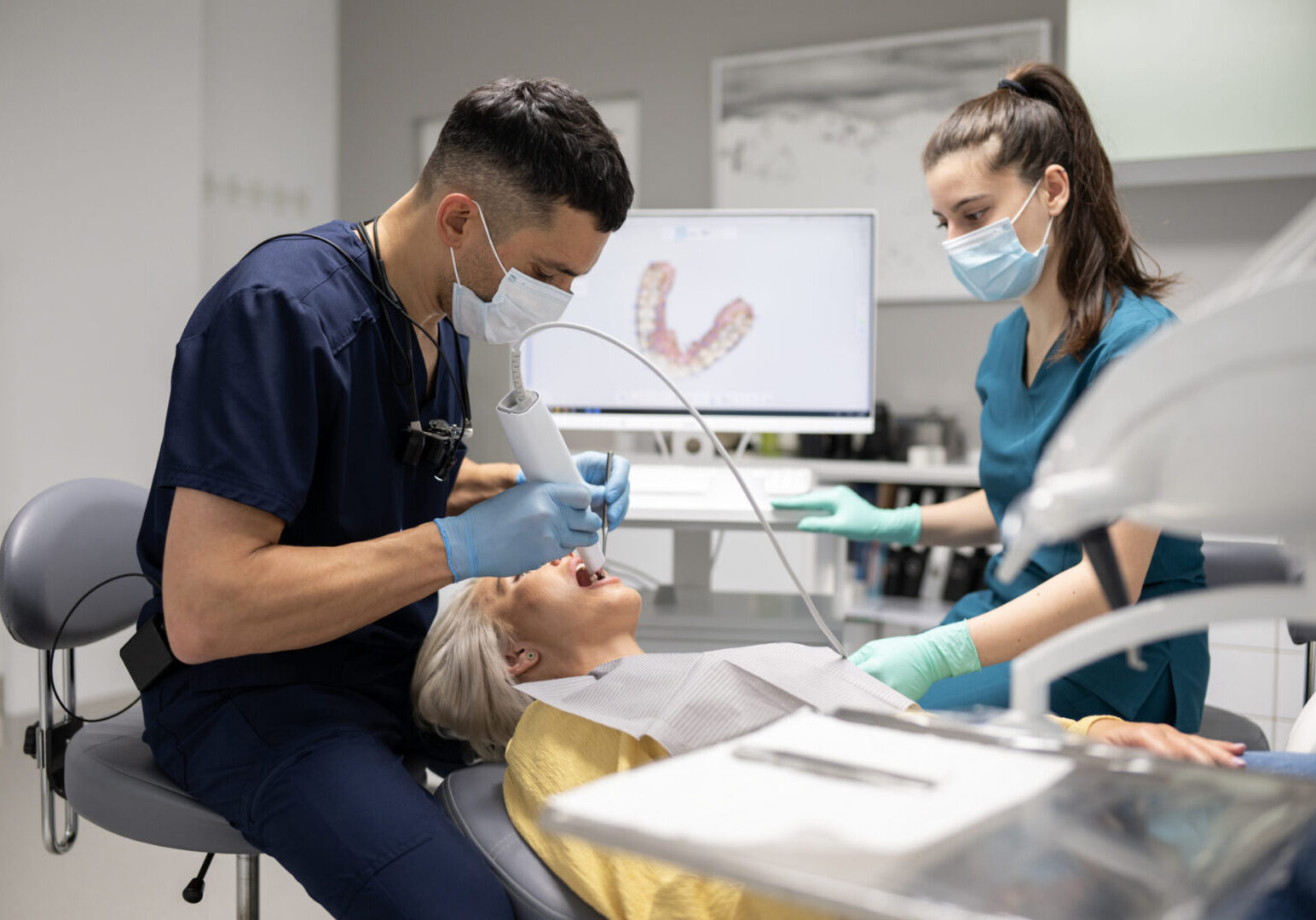Dental team working on a patient